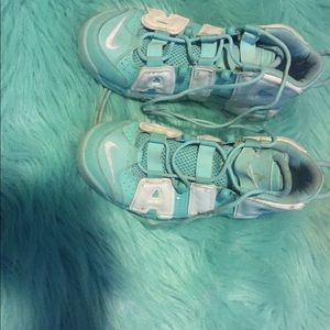 Teal and white Ir Nike’s